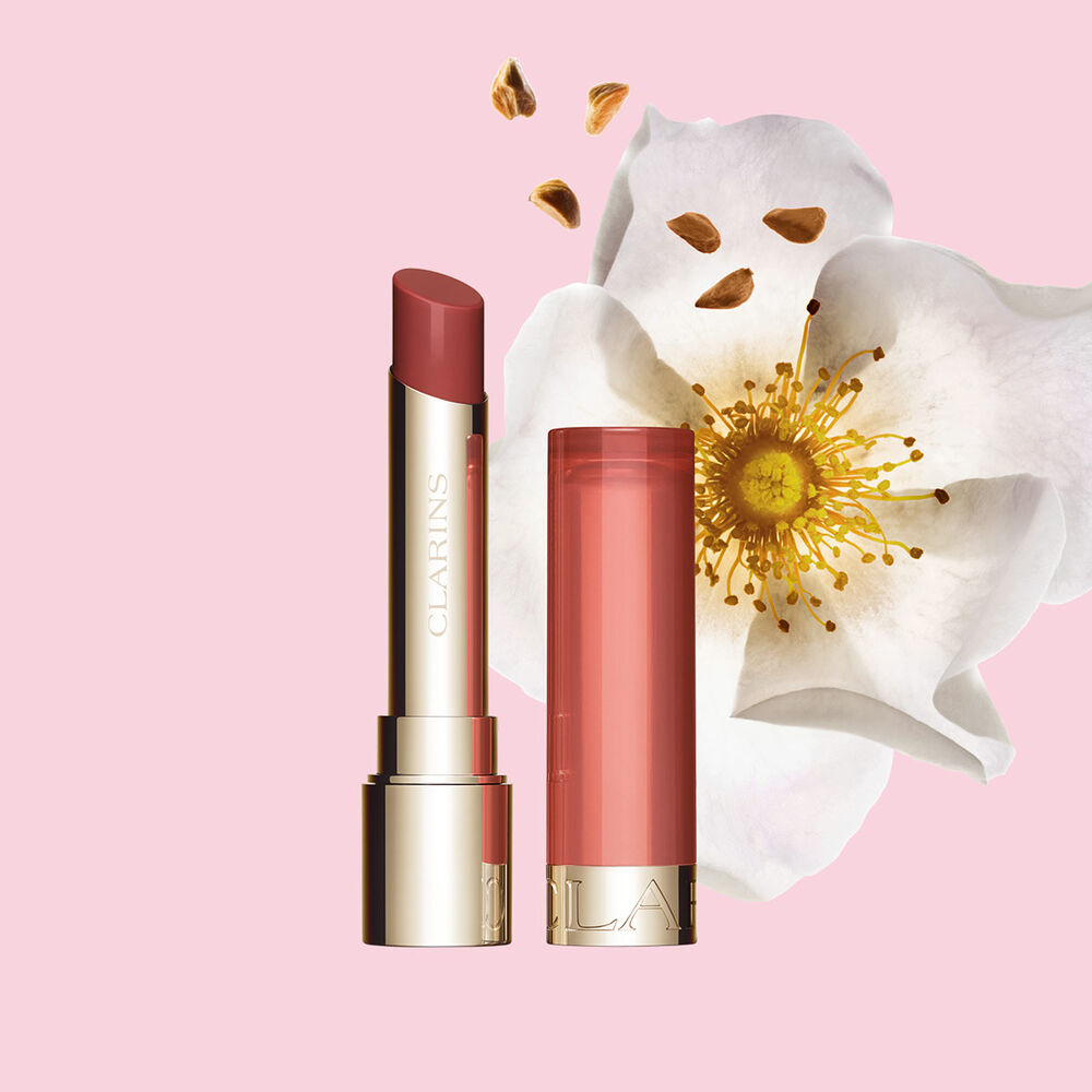 Clarins Nourishing Lip Oil Balm giving a subtle dark red finish