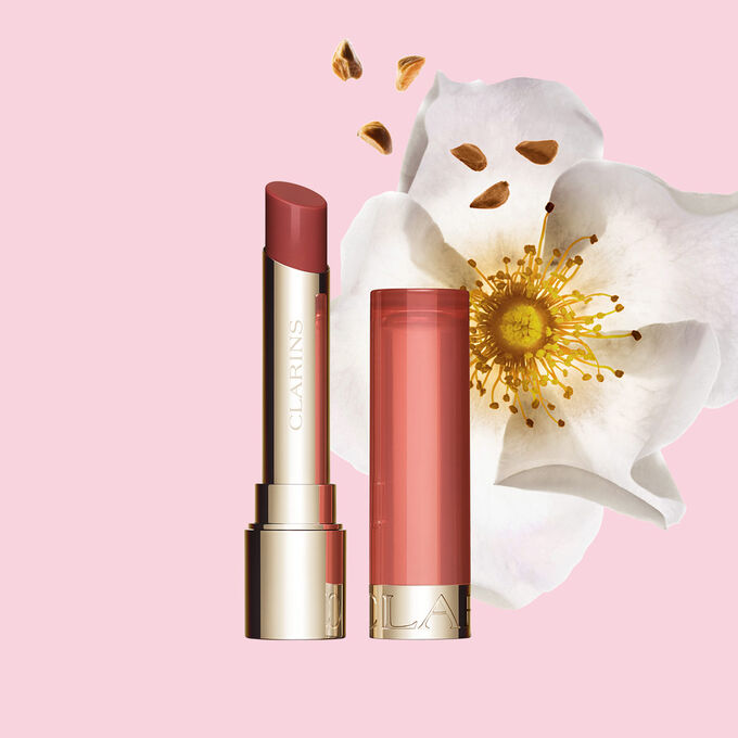 Clarins Nourishing Lip Oil Balm giving a subtle dark red finish