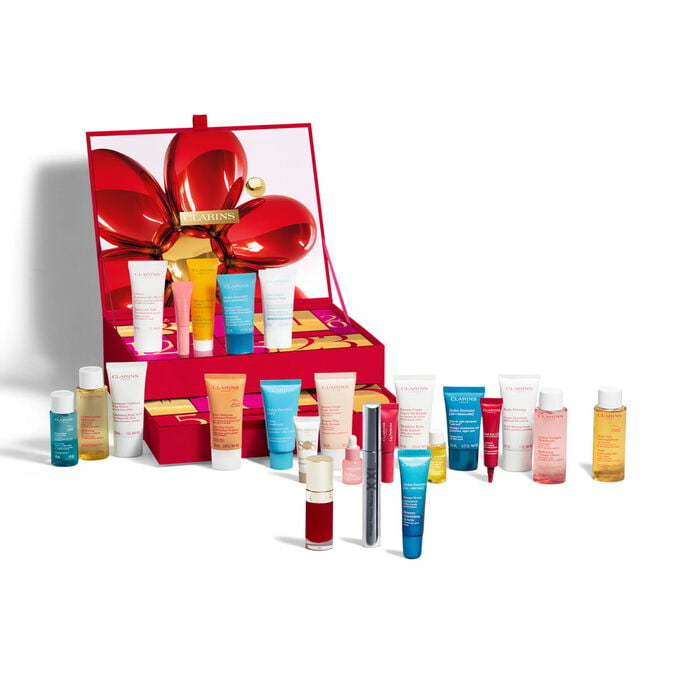 Calendario dell&rsquo;Avvento Beauty Clarins da 24 giorni, con prodotti skincare, corpo e make-up in formato vendita e miniature, in una confezione rossa.
