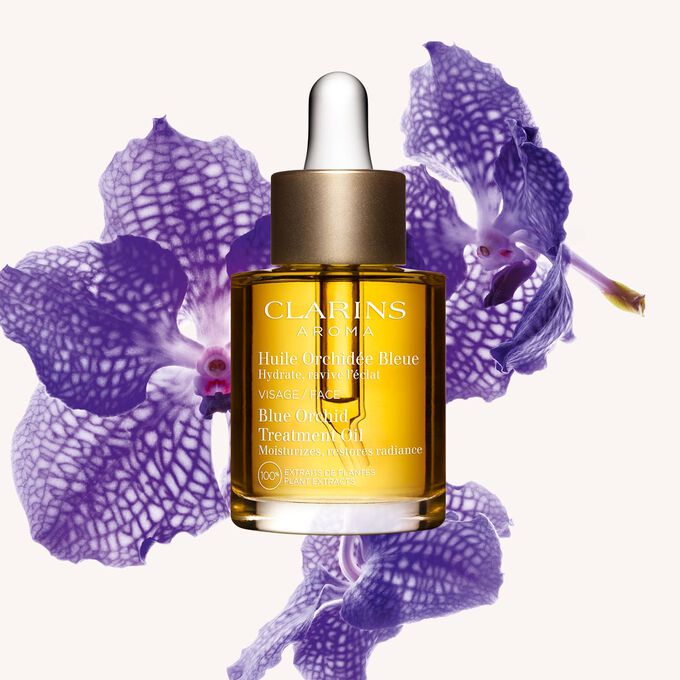 Olio viso Huile Orchid&eacute;e Bleue di Clarins, con estratti vegetali puri al 100% e olio di nocciola, per nutrire in profondit&agrave; la pelle disidratata.