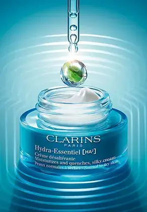 Packshot Hydra-Essentiel [HA2] Crema Idratante con una pipetta e una goccia